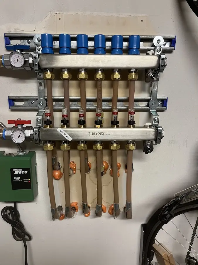 Plumber performing Water Heater Repair at a residential property in DuPont